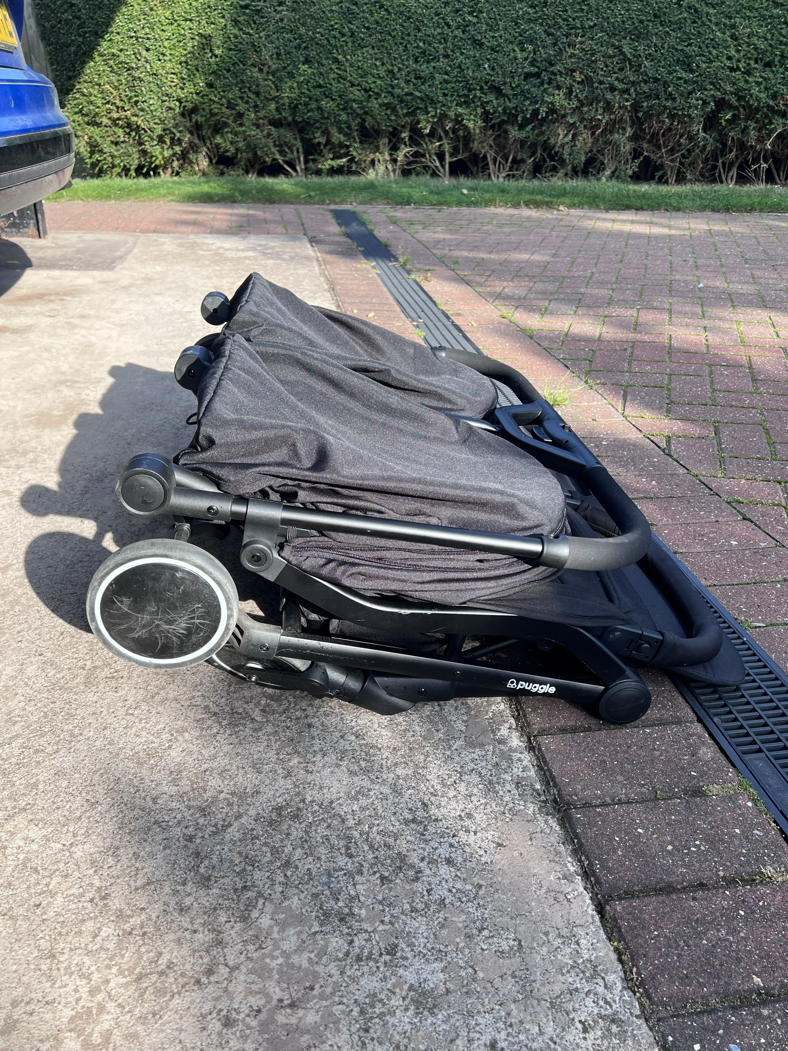 Puggle City Traveller double pushchair folded side view